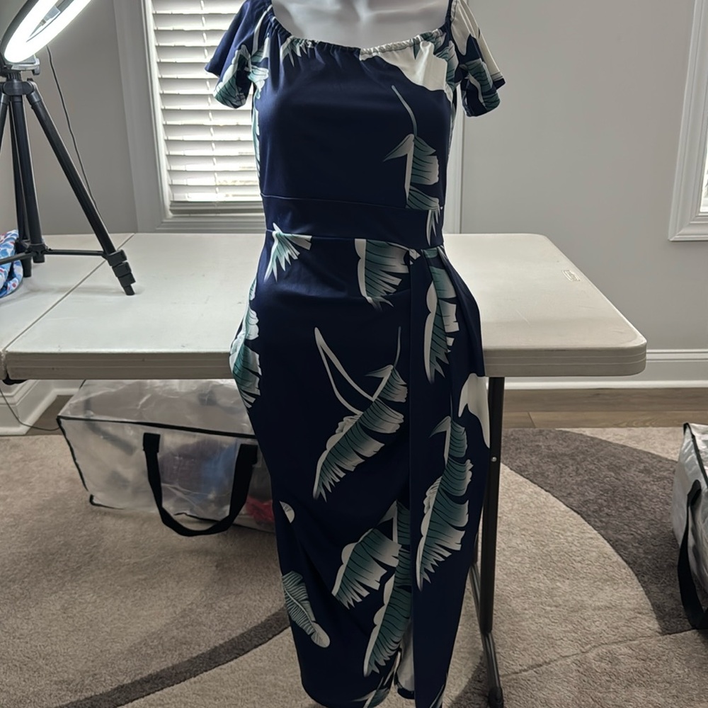 Beautiful floral M Dress with wrap look split. Worn Once